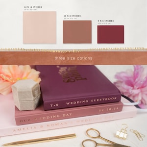 May include: Three square cards in blush, terracotta, and burgundy, with dimensions of 12 x 12 inches, 10 x 8 inches, and 9 x 6 inches. The image also shows a wedding guestbook, ring box, and stationery.