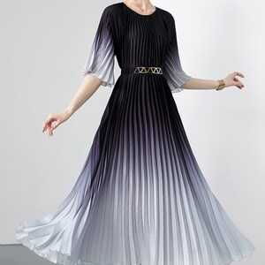LONG ROBE WITH FLARED SLEEVE DRIPPING IN DECO