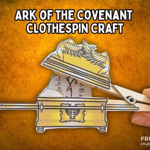 May include: A craft project for making an Ark of the Covenant using a clothespin. The ark is made of paper and has a golden color. The ark has a lid with two cherubim on top. The ark is sitting on a wooden clothespin. The ark has a menorah on the front and the Ten Commandments on the side.