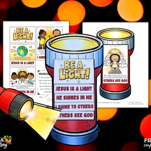 May include: A red and blue illustrated lamp with the text "BE A LIGHT!" and "JESUS IS A LIGHT". The image includes a red flashlight shining light onto the lamp. The image also includes the text "HE SHINES IN ME", "I SHINE TO OTHERS", and "OTHERS SEE GOD".
