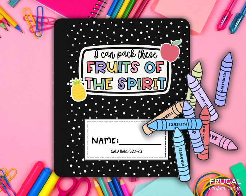 May include: Black notebook with white polka dots and the text "I can pack these FRUITS OF THE SPIRIT." Includes a pineapple and apple sticker. Crayon cutouts with words like "Kindness" and "Patience" are scattered around the notebook.