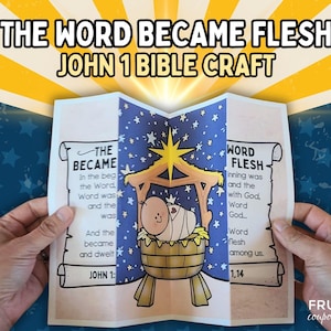 Op de afbeelding: Een gevouwen papieren knutselwerk met de tekst "THE WORD BECAME FLESH JOHN 1 BIBLE CRAFT". Het knutselwerk toont een kerststal met een baby in een kribbe, omringd door sterren. De tekst "JOHN 1" is ook zichtbaar.