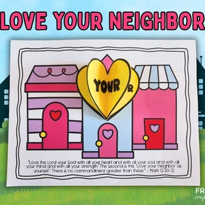 May include: A colourful paper craft with the text "LOVE YOUR NEIGHBOR" at the top. The image features three cartoon houses with heart-shaped doors and a yellow heart with the word "YOUR". A Bible verse is printed at the bottom.