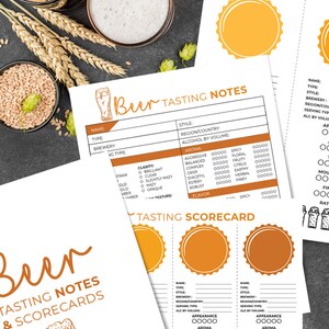 May include: Overhead shot of beer tasting notes and scorecards with two glasses of beer, wheat stalks, and hops. The scorecards have a sunburst design and space for notes. The words "Beer Tasting Notes & Scorecards" are visible.