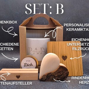 May include: A gift set including a ceramic mug, wooden coaster, heart-shaped wooden decor, and a card holder. The set comes with a gift box and labels. The mug has the word "Papa" printed on it. The coaster has a heart cutout.