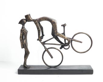 Abstract, bronze sculpture, romantic couple, modern art, figurative sculpture, minimalist design, loving embrace, contemporary sculpture