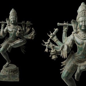 May include: A bronze statue of a multi-armed Hindu deity, possibly Shiva, in a dancing pose. The statue is green with a patina and has intricate details.