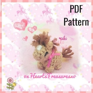 May include: A crocheted horse with a tan body, brown mane and tail, and a pink ribbon. The image has the text "PDF Pattern" and the shop name "oxHeartsTreasuresxo". The background is pink with heart and star patterns.