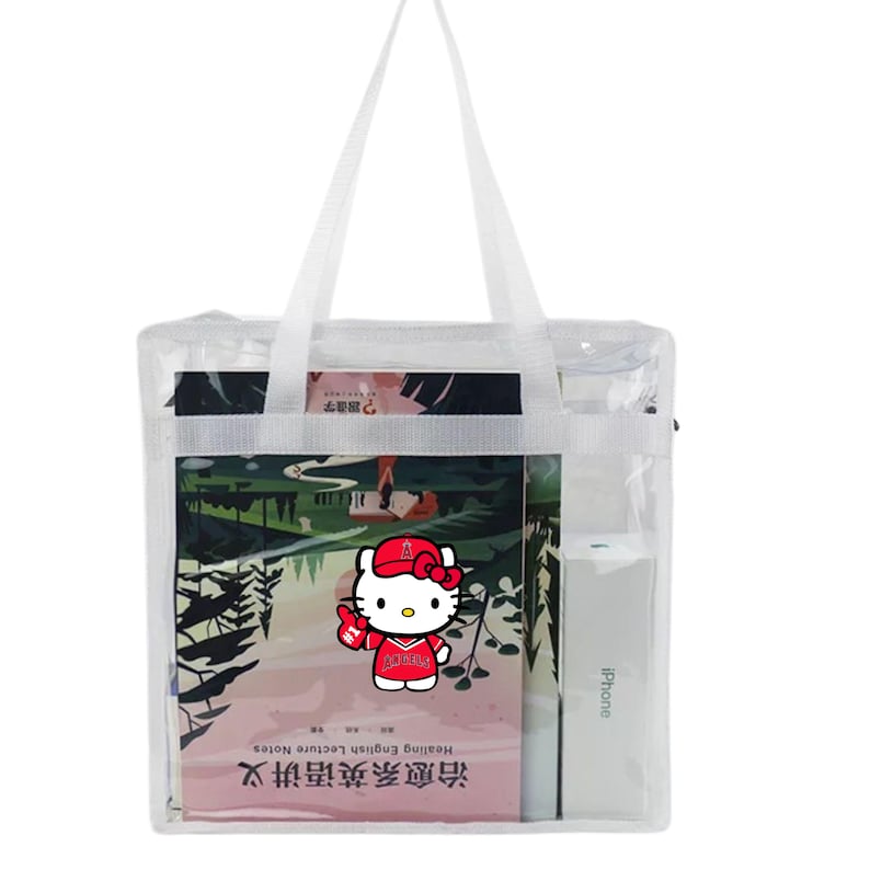 May include: A clear plastic tote bag with a white handle and a Hello Kitty design. The bag is filled with books and a white phone case. The text on the book reads "Hearing English Lecture Notes 六 讲英语 课堂笔记".