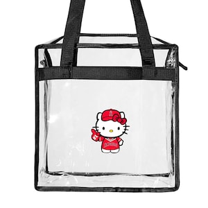 May include: Clear plastic tote bag with black handles and a zipper closure. The bag features a Hello Kitty graphic wearing a Los Angeles Angels baseball cap and jersey.