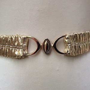 Vintage women&#39;s metallic gold Lamé belt stretch elastic waist accessories fashion wardrobe Renaissance maximalist 80s dance floor vibe glam