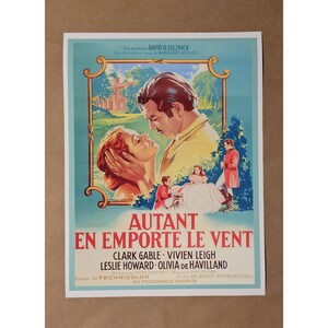 May include: A vintage movie poster for "Gone With The Wind" featuring Clark Gable and Vivien Leigh. The poster has a teal border and depicts the actors in a romantic embrace, with the title in large red letters. The poster also includes the names of the actors and the production company.
