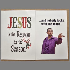 May include: Two-panel Christmas card with text and a photo. The left panel reads "JESUS is the Reason for the Season" in red, green, and black. The right panel shows a man in a purple shirt with the text "...and nobody fucks with The Jesus."