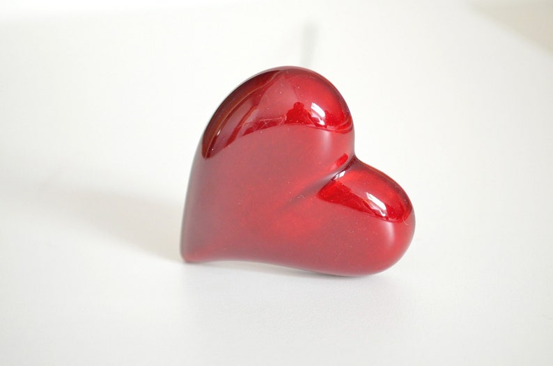 Handcrafted ceramic heart.

You can add to ceramic flower bouquet.