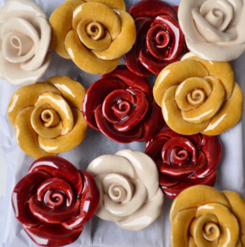 Ceramic rose bouquet.

Handcrafted ceramic flower.