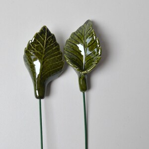 Handcrafted ceramic rose leaf.

You can add to ceramic flower bouquet.