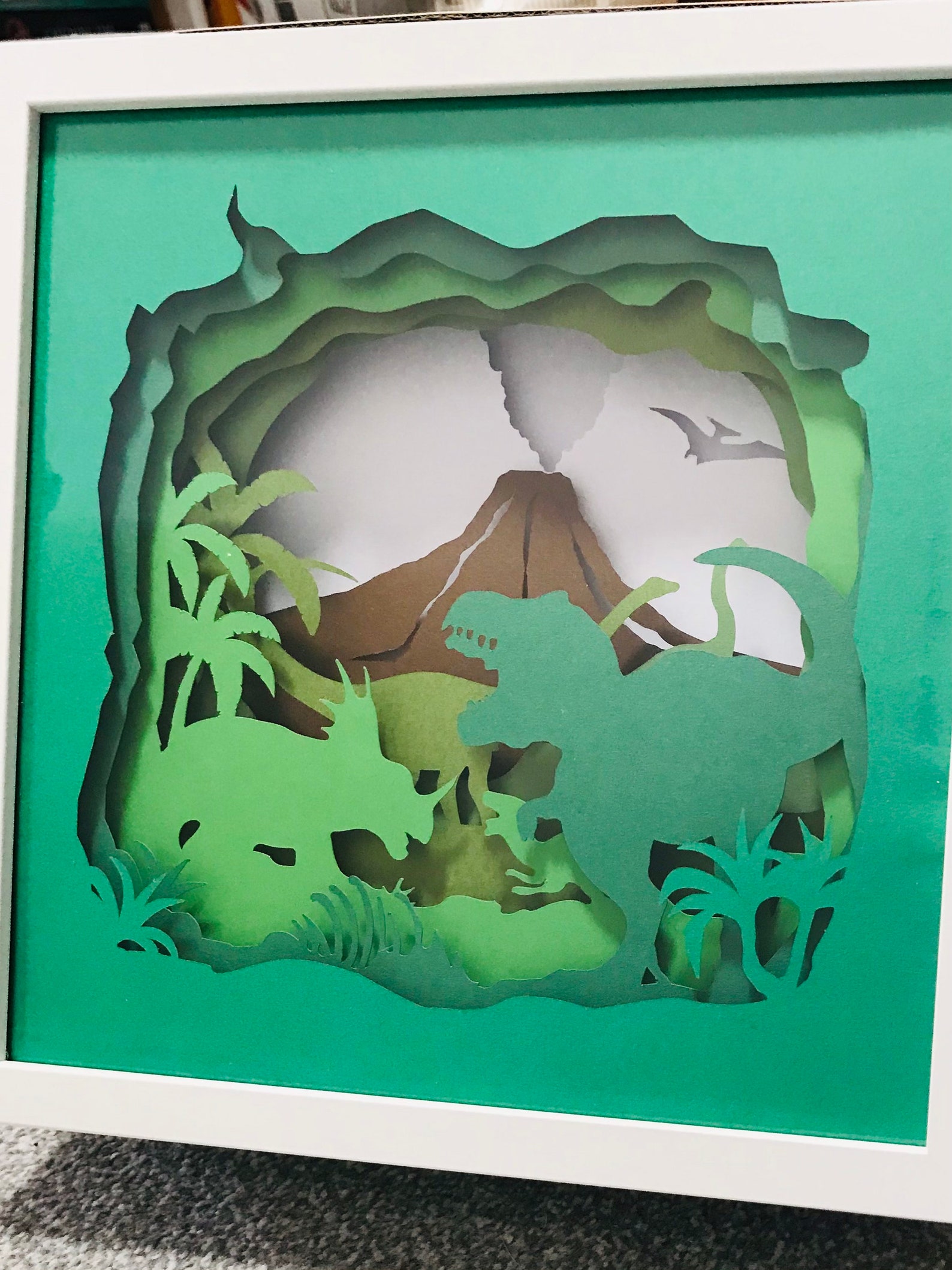 Dinosaur papercut shadow box | Etsy