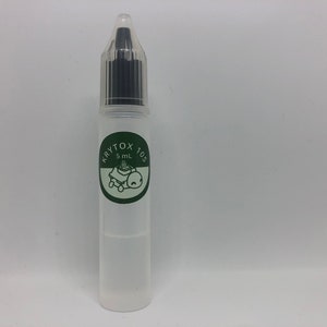 May include: A clear plastic bottle with a black dropper cap. The bottle is labeled "Krytox 105" and "5 mL".