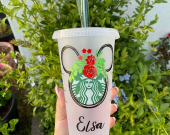 Minnie Mouse Starbucks tumbler with flower crown.