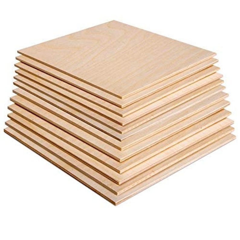 May include: A stack of 12 unfinished wood squares, each measuring 12 inches by 12 inches. The wood is a light brown color and has a smooth surface.