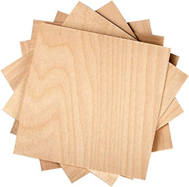 May include: A stack of five unfinished wood squares, each measuring 12 inches by 12 inches. The wood has a natural grain pattern and is light brown in color.