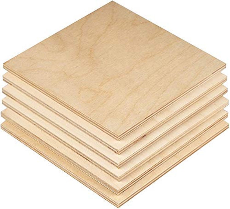 May include: A stack of five unfinished wood squares, each measuring 12 inches by 12 inches. The wood is a light brown color and has a smooth surface.