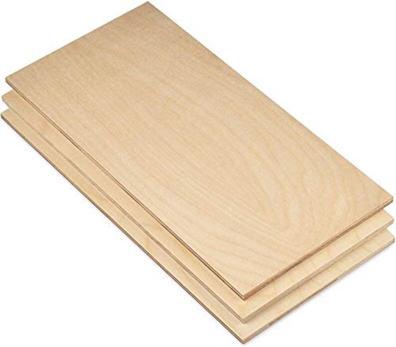 May include: Three sheets of unfinished, natural wood plywood. The plywood is light brown and has a smooth surface.