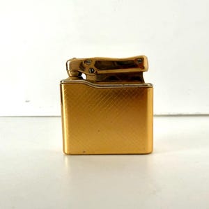 ポリイ Moflin ゴールド Vintage Colibri Gold Tone Monogas Monopol Slim Pocket Lighter - Etsy