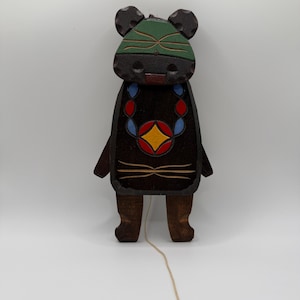 Vintage Wooden Jumping Jack Hampelmann Pull-String Puppet Toy designed in a Southwestern or Native American-inspired folk art style