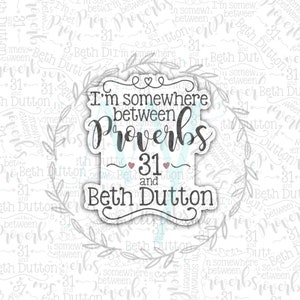 May include: A white background with a black and white graphic design featuring a wreath with leaves and the text "I'm somewhere between Proverbs 31 and Beth Dutton".