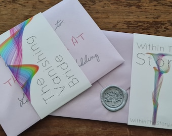 May include: Two pink envelopes with a wax seal featuring a tree design. One envelope has a white card with a rainbow design and the text "The Vanishing Bride" and the other envelope has a white card with a rainbow design and the text "Within The Story" and the website address "WithinTheStory.co.uk".