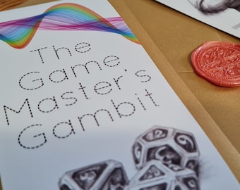 May include: A white card with the text "The Game Master's Gambit" in black outlined letters. The card has a rainbow wave design in the top left corner and a drawing of three dice in the bottom right corner.