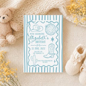 May include: A rectangular birthday invitation card with a light blue and white striped border. The text reads: We're celebrating Elizabeth's 2nd Birthday, 25 June, 20XX, 3250 19th Ave, San Francisco, CA. Graphics include a cowboy hat, disco ball, boot, and cactus.