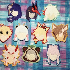 May include: Ten embroidered patches featuring various anime characters with different hair colors and styles. The patches are on a blue and purple checkered background.