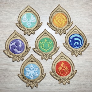 May include: Seven embroidered patches in the shape of a teardrop with a gold outline. Each patch features a different coloured symbol inside: blue, purple, green, orange, light blue, white, and red.