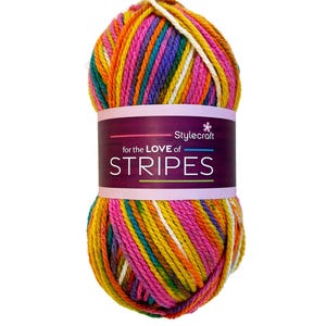 May include: A ball of multi-coloured yarn with stripes of pink, orange, yellow, green, blue, and purple. The label reads "Stylecraft for the LOVE of STRIPES".