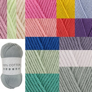 May include: A collection of 16 balls of 100% cotton yarn in various colours, including light green, pink, yellow, blue, grey, and red. The yarn is arranged in a grid pattern. One ball of grey yarn is in the foreground, with a label that reads "100% Cotton".