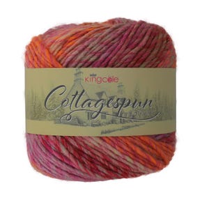 May include: A ball of King Cole Cottagespun Chunky yarn in a pink, orange and beige colourway.