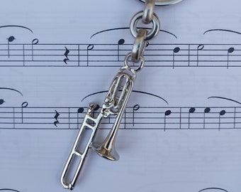 Trombone keychain. Silver trumpet, ideal as a gift. Trombone keychain.