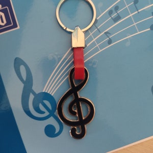 Black enamel treble clef keychain with red leather strap. Musical symbol keychain. Violin keychain. Violin keychain. Treble clef.