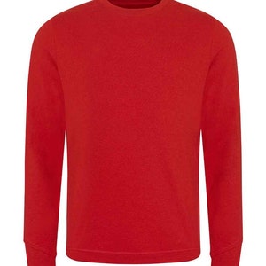 May include: A solid red crew neck sweatshirt with long sleeves. The sweatshirt has a ribbed hem and cuffs. The fabric appears to be a soft, knit material. The overall style is casual and comfortable.