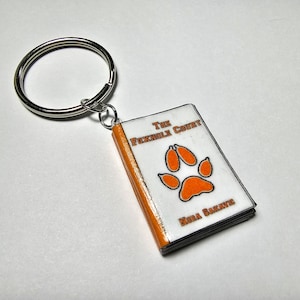 The Foxhole Court Mini Book Keychain Or Magnet