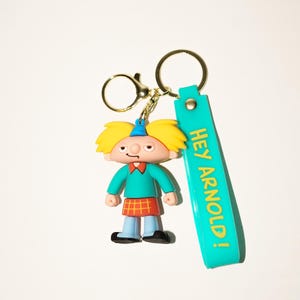 Hey Arnold! Kawaii Keychains - Helga, Arnold & Gerald PVC Figurines. Perfect for fans! Collect all 3 unique cartoon character keychains