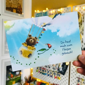 Postkarte Fliegen | Freundschafts-Postkarte mit inspirierendem Motiv | Karte für Mut und Leichtigkeit