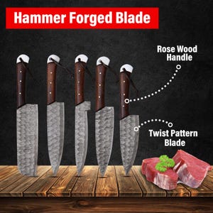 May include: Set of six kitchen knives with hammer forged blades and rose wood handles. The blades have a twist pattern. The knives are displayed on a wooden surface.