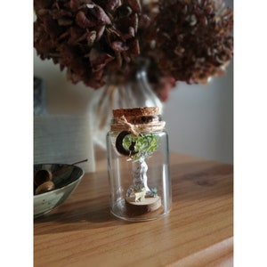 Good luck charm in a glass jar with a moon cat charm image 1