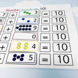 May include: A printable worksheet with the title "Number bonds to 10!"  The worksheet has a grid with addition problems. Each problem has a number of dots in a box, and the sum of the dots and the number in the box equals 10. For example, 7 + 3 = 10.