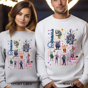 Puede incluir: Sudaderas grises deportivas y blancas con un dise&ntilde;o gr&aacute;fico colorido con personajes de Zootopia. Las sudaderas tienen la palabra "Zootopia" en escritura azul. La parte inferior de la sudadera gris deportiva dice "SPORT GREY" y la sudadera blanca dice "WHITE".