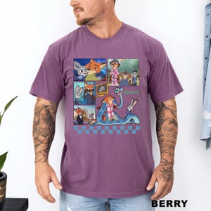 以下が含まれることがあります： ベリー色のTシャツ。アニメ映画「ズートピア」のキャラクターのカラフルなグラフィックが特徴です。グラフィックには、キツネ、ウサギ、その他のキャラクターの画像が含まれています。「ズートピア」の文字も表示されています。