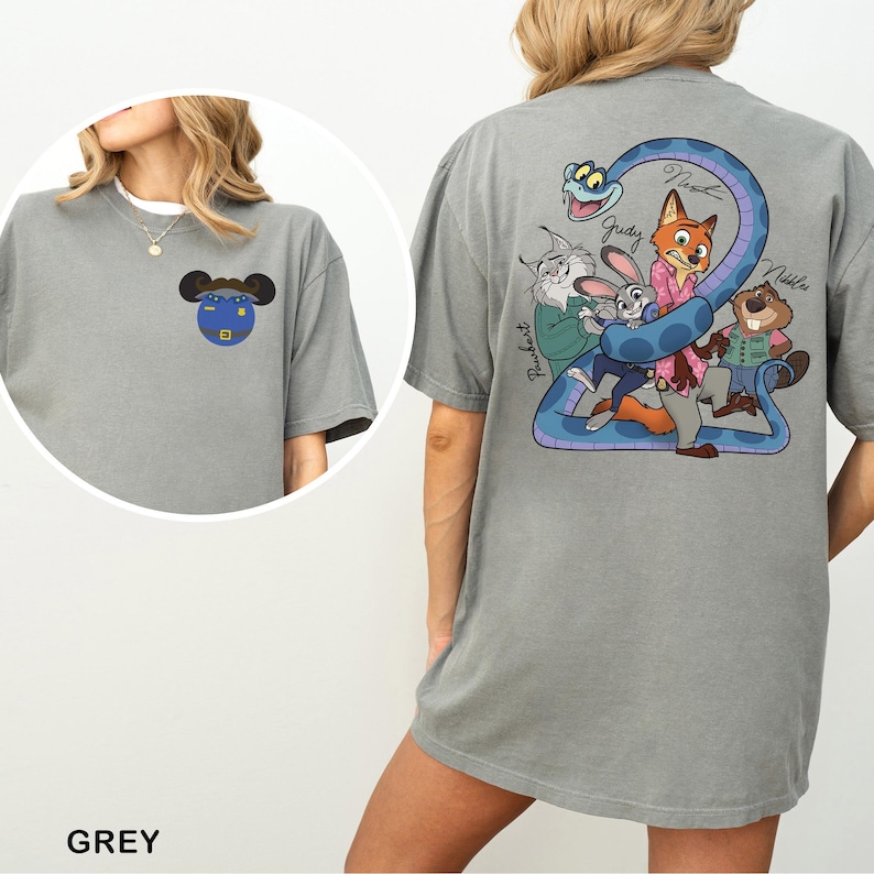 May include: Grey t-shirt with a cartoon design on the front and back. The front has a Mickey Mouse-inspired design. The back features a blue snake wrapped around cartoon characters, with the names Judy, Nick, and Nibbles.
